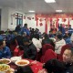 新春走基层｜200余名快递小哥一起吃年夜饭过除夕